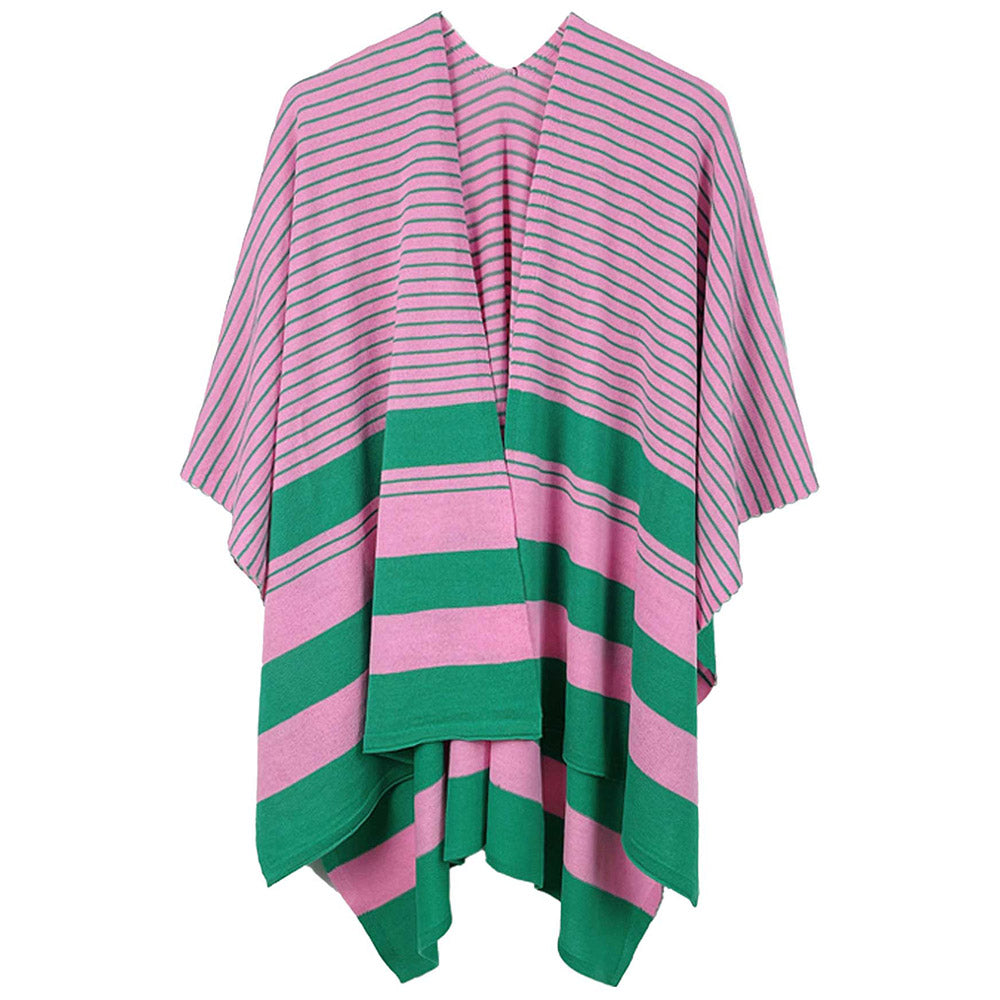 Pink and green striped poncho on a white background